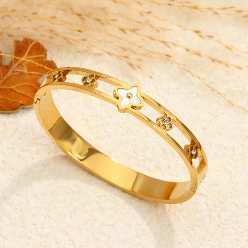 Gold braided cuff bangle